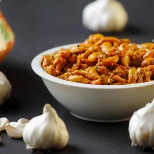 A bowl of DNachiys Garlic Pickle