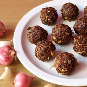 A plate full of DNachiys Onion Vadagam balls