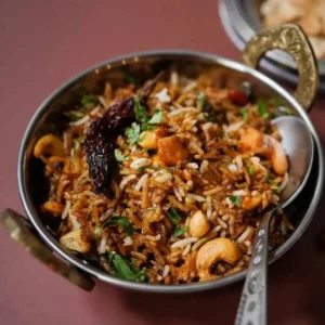 A bowl of rice mixed with DNachiys Puliyogare Mix